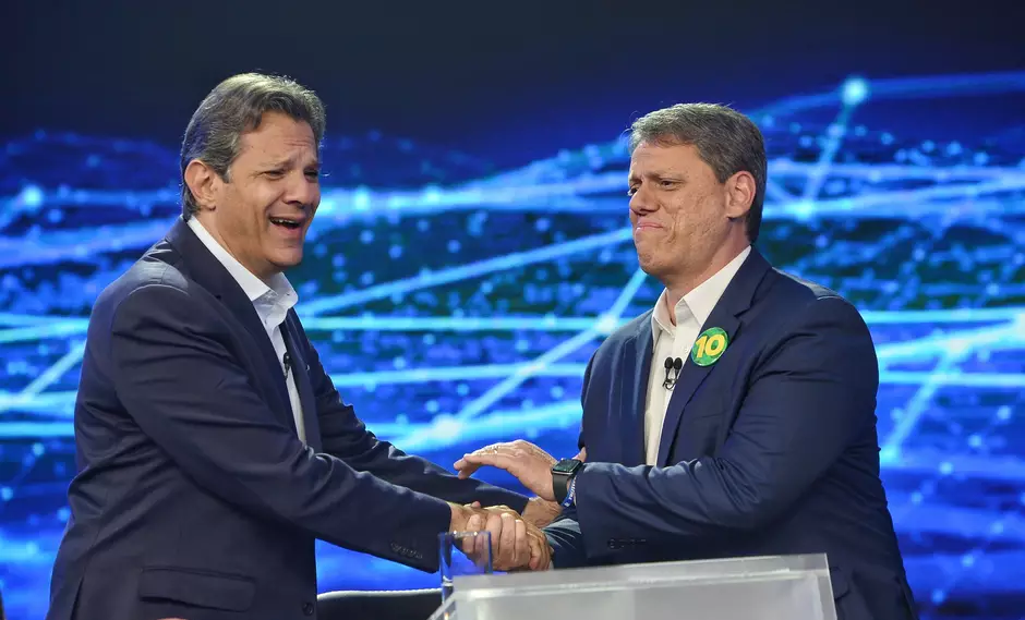 Tarcísio e Haddad durante o debate realizado na TV Band