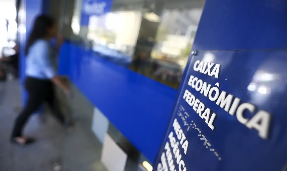 Placa da Caixa, uma referência à distribuição de lucros do FGTS